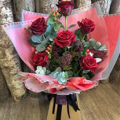 Half a Dozen Red Roses